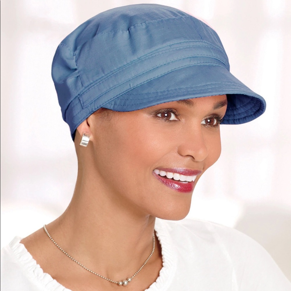 Blue cotton conductor’s hat. Size Petite/Average. New in original package.